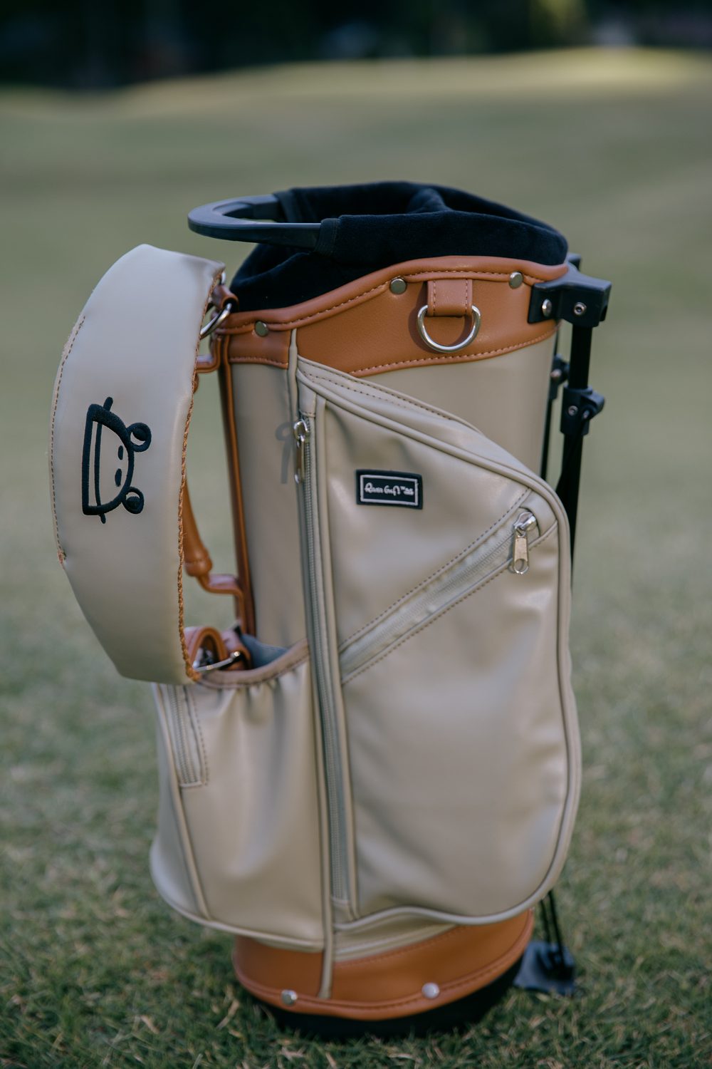 Leather-look trim and chrome hardware detail